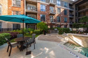 One Bedroom Apartments for Rent in Houston, TX - Up Close Pool Fountain & Seating Area 